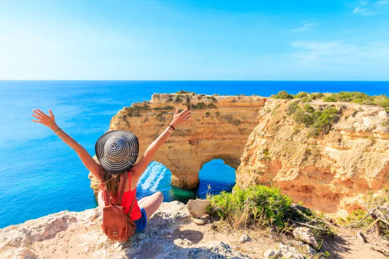 Woman,Tourist,Enjoying,Panoramic,View,Of,Beautiful,Algarve,Heart,Shaped